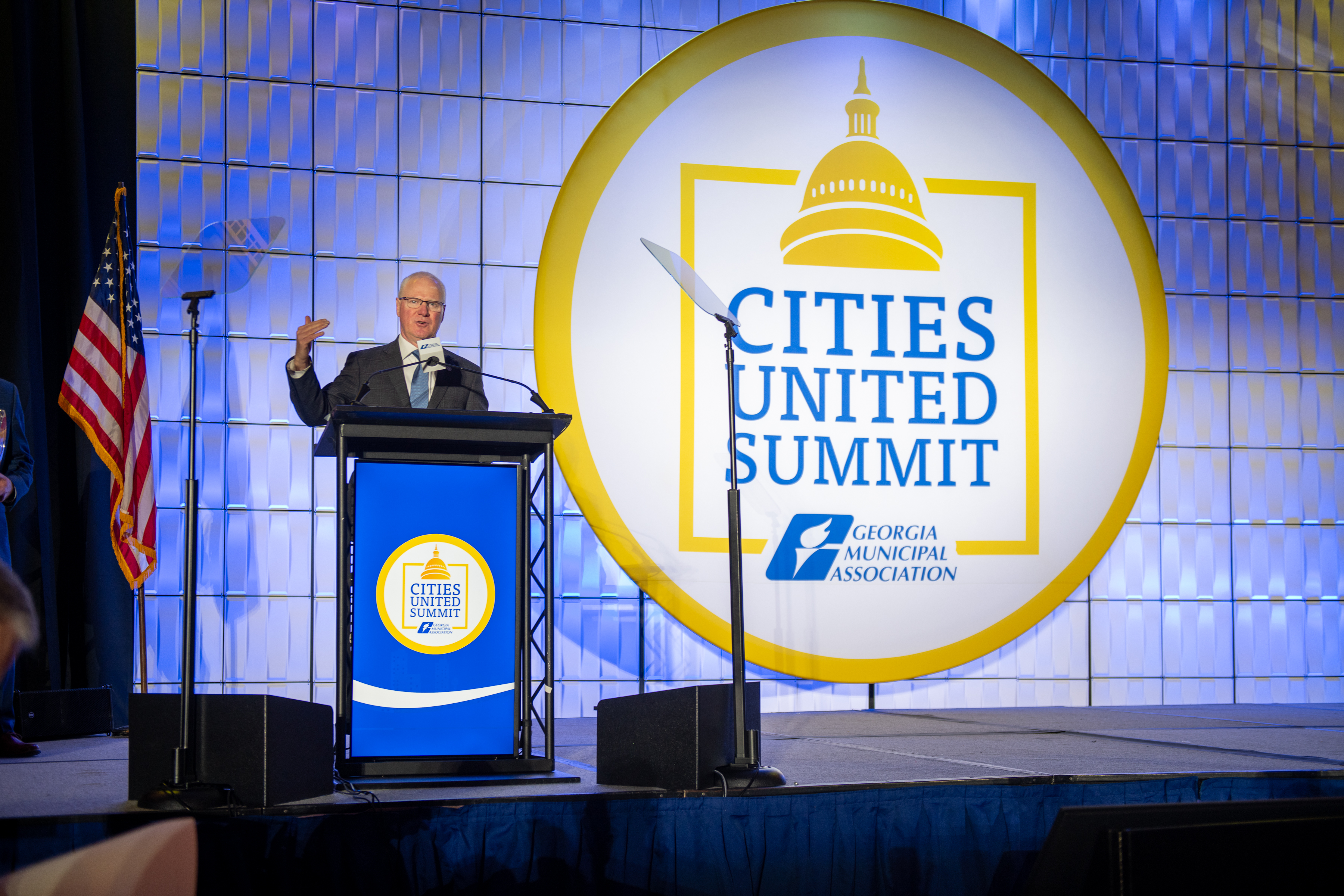 Commissioner Russell McMurry speaks at the Capitol Connection Breakfast at GMA’s 2025 Cities United Summit. 